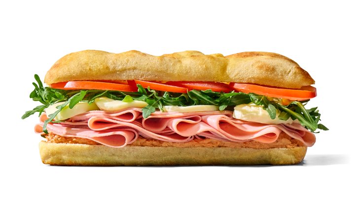 Na slici je sendvič Bologna u focacci s mortadelom, mozzarellom, rikolom i rajčicom.